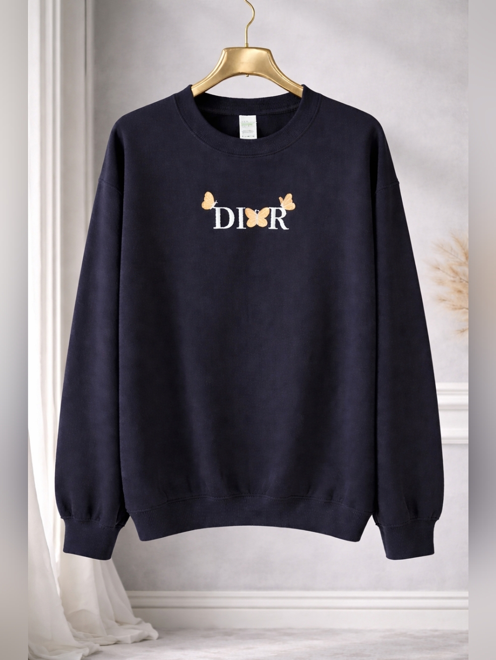 Whimsical Black Sweatshirt with Peach Butterflies.